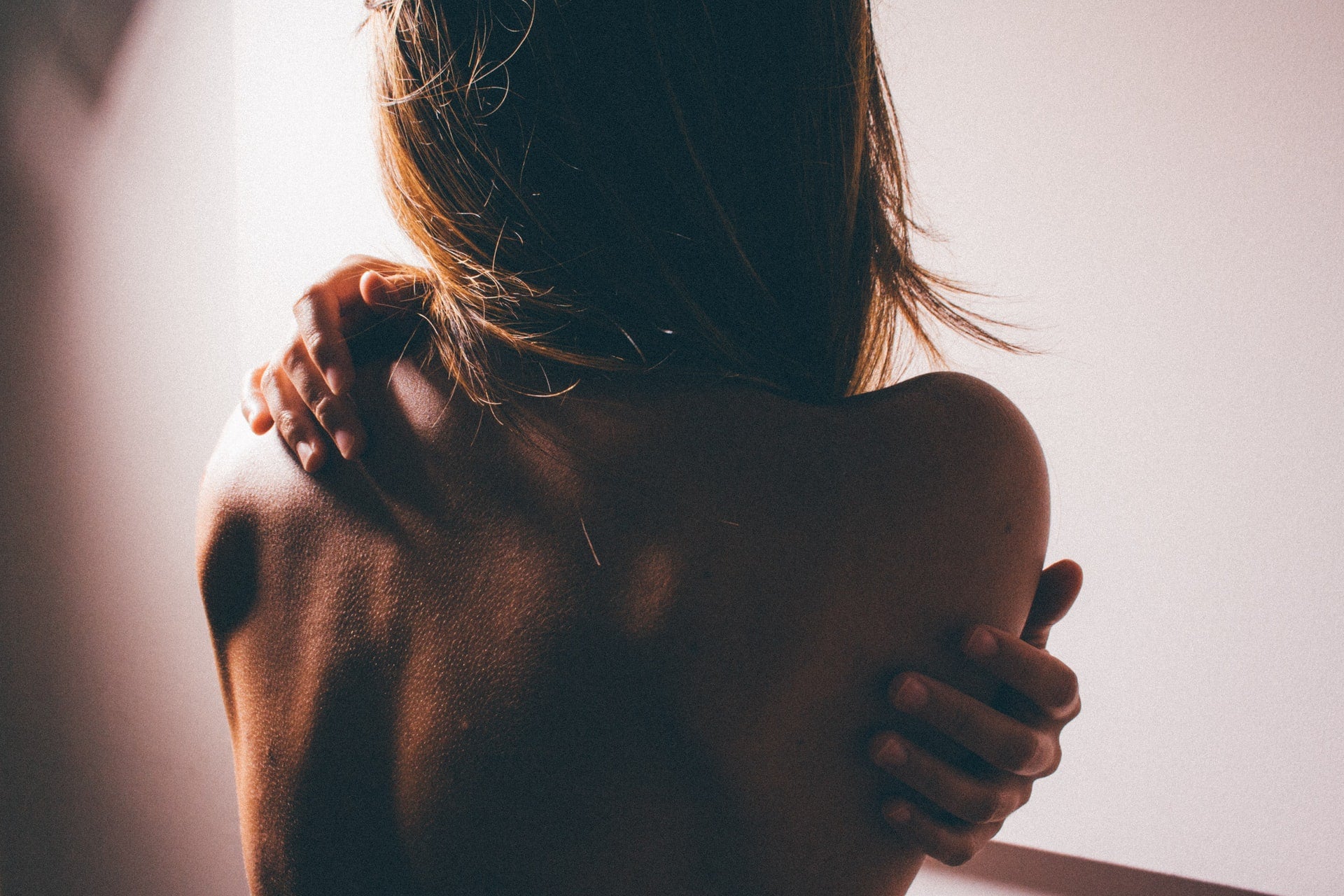 Rhomboid Muscle Pain: Symptoms & Treatment Guide